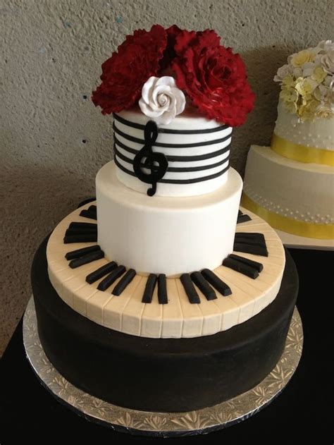 She swears she doesn't need anything else to survive. Adorable piano themed cakes