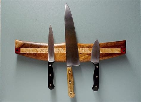At a generous 18 inches long, this magnetic holder has plenty of space for all the knives that don't fit well in your knife block, whether they're bulky santoku knives or small paring knives. Handmade Storage: 5 Magnetic Knife Strips From Etsy ...