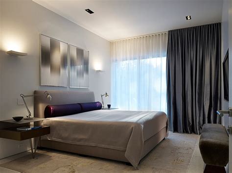 A bed in the corner will create a distinct sleeping space separate from everyday living, especially when it's enclosed by a privacy curtain. Sheer Curtains Ideas, Pictures, Design Inspiration