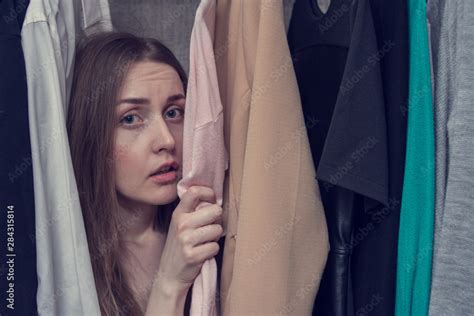 Scared Woman Mistress Hiding In The Closet Portrait Close Up Secret Lovers Concept Stock