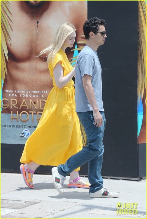 Elle Fanning Holds Hands With Boyfriend Max Minghella While Shopping