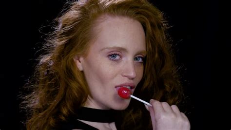 Sexy Redhead Licking Lollipop Stock Footage Video 100 Royalty Free 1021535596 Shutterstock