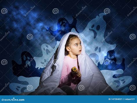 Scared Girl With Pillow Hiding Under Blanket Stock Image Image Of