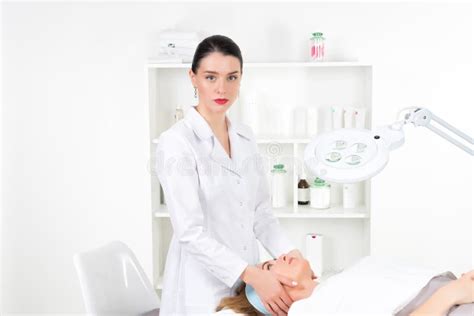 Female Beautician Doctor With Patient In Wellness Center Professional Cosmetologist Make