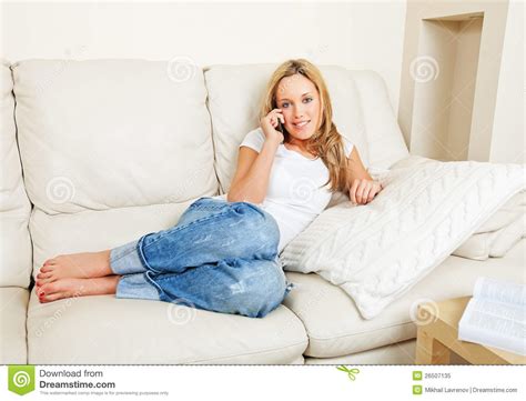 This best photo collections about lay down couch is available to save. Young Woman On Sofa With Phone Stock Image - Image of ...