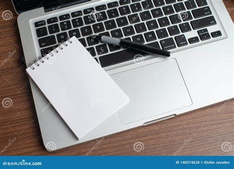 Laptop With Notepad And Pen Editorial Stock Photo Image Of Business