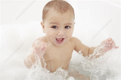 Baby Splashing In Bathtub Stock Image F0099987 Science Photo Library