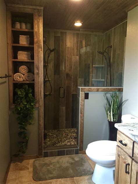 If your bathroom remodel includes one, a clear glass shower enclosure allows the tile design inside to be featured. Rustic master bathroom upgrade, wood tile shower, custom ...