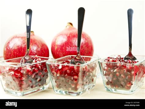 Pomegranate Desserts In Glass On White Background Raw Healthy