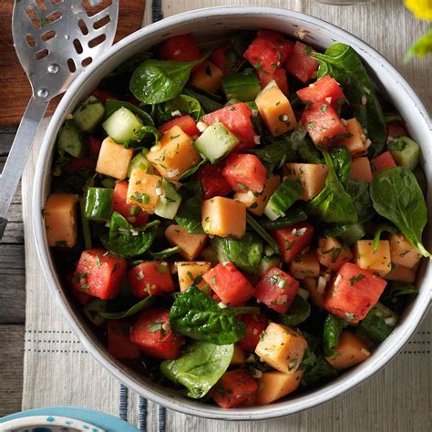This simple spinach salad is loaded with crisp spinach, creamy avocado, and juicy cherry tomatoes and its tossed in an incredible greek salad dressing. Watermelon and Spinach Salad Recipe | Taste of Home