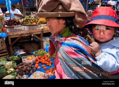 Sacred Valley Pisac Peru A Mother And Her Son Dressed In A
