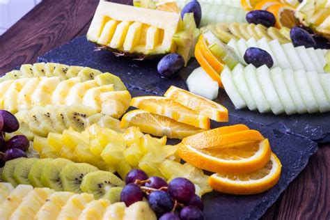 Sliced Fruits On A Plate Stock Photo Image Of Fresh 166071930