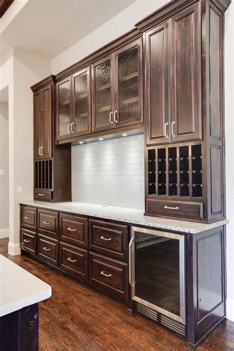 The kitchen source is a full turn key design and remodel firm dedicated to providing the best client experience in the dfw metroplex and throughout texas. Wine storage in buffet area #dreamhome #interior #interiors #interiordesign #dfw #dallas # ...