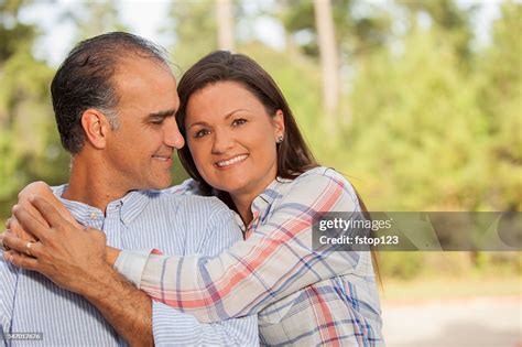 Mature Mixedrace Couple Outdoors In Summer High Res Stock Photo Getty