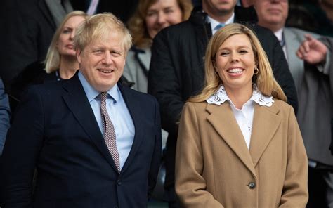 Boris johnson and carrie johnson pose together for a photo in the garden of 10 downing street after their wedding on saturday credit: Boris Johnson and Carrie Symonds 'to marry next summer'