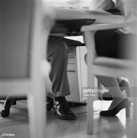 Legs Under Desk Photos Et Images De Collection Getty Images