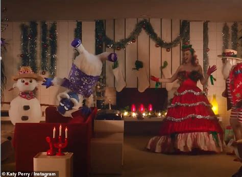 katy perry gets into the holiday spirit with a new music video for last year s jingle daily