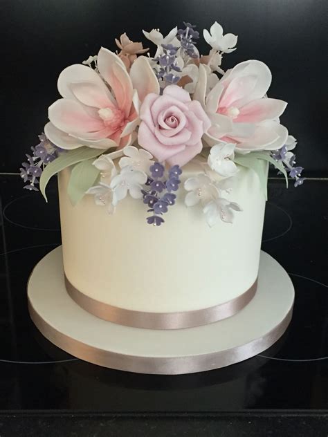 Single Tier Wedding Cake With Stunning Flowers Works Equally Well As A