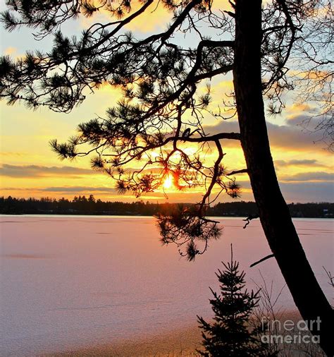 Sunset Over The Frozen Lake Minnesota Photograph By Ann Brown Fine