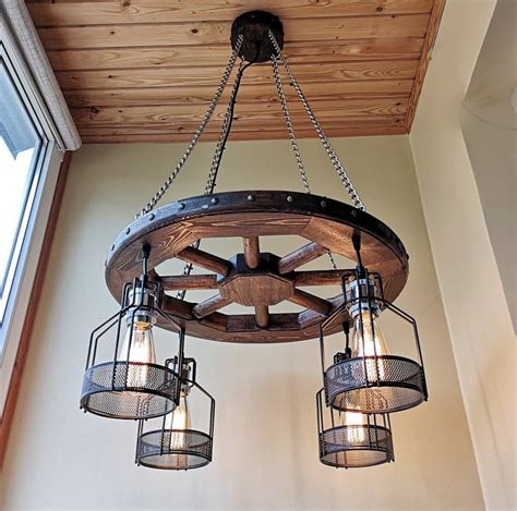 This material is very durable. Pendant Light Barn light fixture Wagon wheel Rustic | Etsy ...