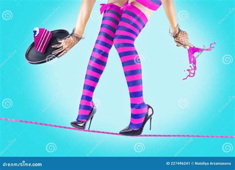 Women`s Legs In Striped Stockings On A Rope Stock Image Image Of