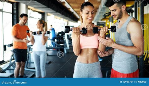 Group Of Friends Exercising Together In Gym Stock Image Image Of