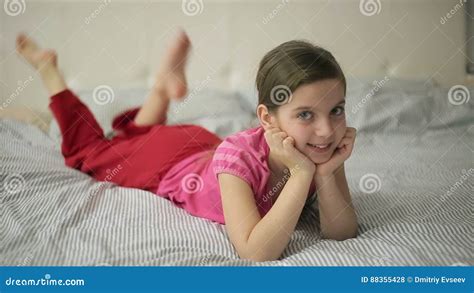 Girl Lying On The Bed Moves Feet Stock Footage Video Of Limberingup