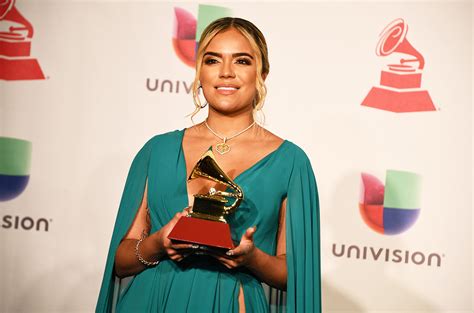 Karol G Joins Yahritza Martinez As The Only Women To Rule Latin