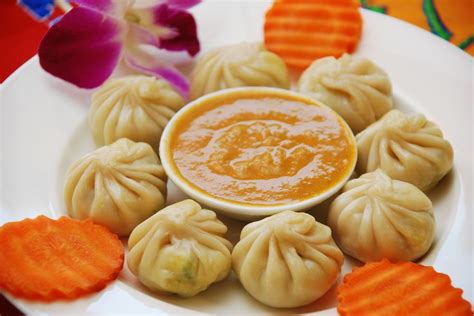 momo nepal a nepalese delicacy momo is a type of steamed or fried dumpling commonly served