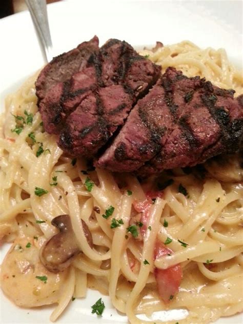 Add cream and milk, turn heat to medium high and simmer for 5 to 10 minutes. Bistro steak and shrimp with lobster alfredo - Yelp