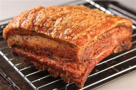 This Slow Roasted Pork Belly Becomes Tender With A Crispy Skin Recipe Pork Belly Recipes
