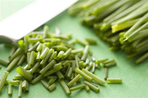 Pile Of Fresh Chopped Green Chives On A Board Free Stock Image