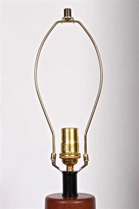 We believe that lighting is like jewelry for your home. Tall ESA Danish Modern Teak and Black Leather Sleek Barrel ...