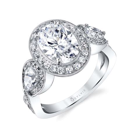 Oval engagement rings oval engagement rings feature oval cut diamonds, which have a modern cut that gives the stones a lot of brilliance and fire. Zara - Three Stone Oval Engagement Ring | Sylvie