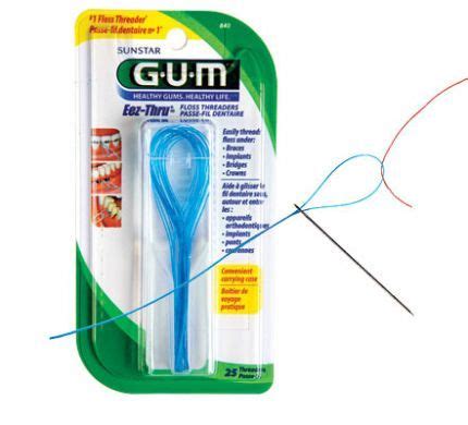 How to floss a permanent retainer | premier orthodontics. Thread needles with a floss threader | Braces retainer and ...