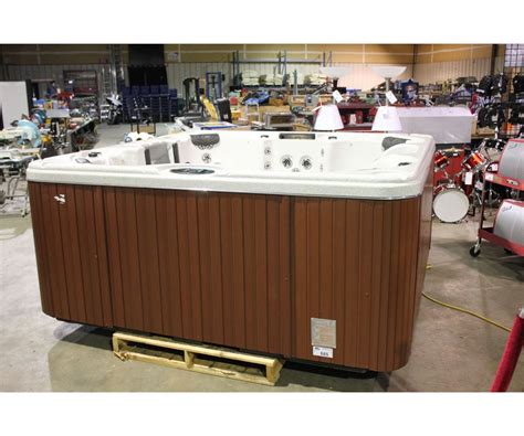 Cal Spas Escape Select Series Hot Tub With Sahara Interior And 8 Mahogany Cabinet C W Able