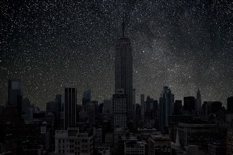 See A Darkened Sky Above Your Favorite Cityscape Space