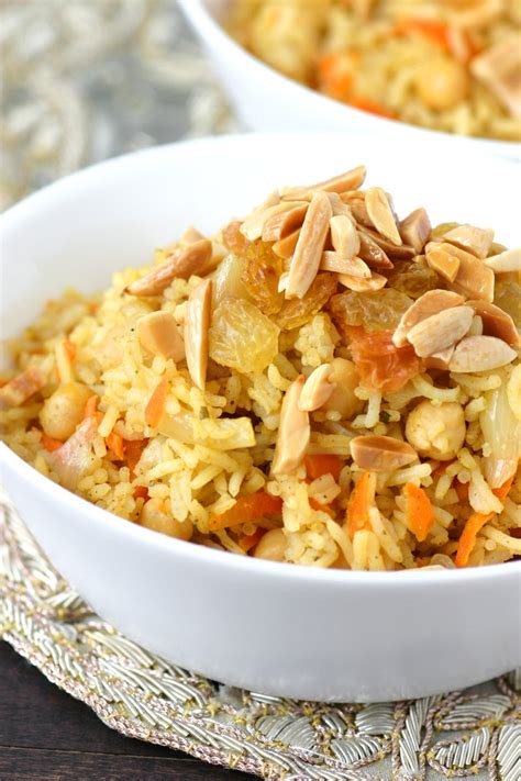 Lightly seasoned with garlic, cumin, and cilantro, vibrant turmeric yellow mediterranean rice is an easy 30 minute vegan side dish. Bukhari Rice | Lands & Flavors