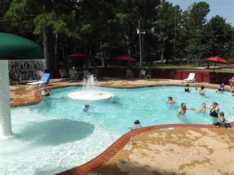 These are comfortable quarters with a fully furnished kitchen, a living room with a pull out sofa bed, a private bedroom, and a full bathroom. Jellystone Park at Whispering Pines RV & Cabin Resort ...