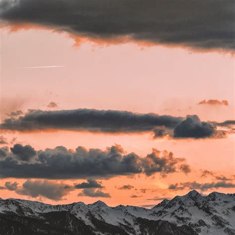 Download Wallpaper 3415x3415 Clouds Sky Sunset Porous Mountains