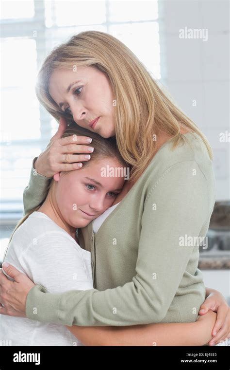 Mother Hugging Daughter Sad Hi Res Stock Photography And Images Alamy
