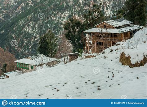 Snow Covered Wooden House In Mountains Majestic Winter Landscape In