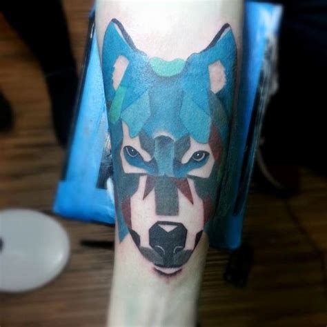 Abstract Style Painted Colorful Wolf Tattoo On Arm Tattooimagesbiz