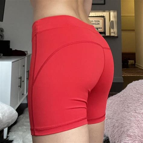 medium red workout shorts spandex thigh length depop