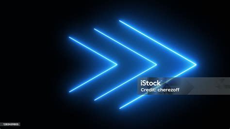 Blue Neon Arrows On A Dark Background Stock Photo Download Image Now