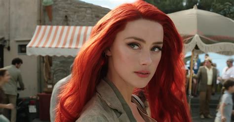 Amber Heard Trolls Haters By Staying In Aquaman Sequel Geekosity