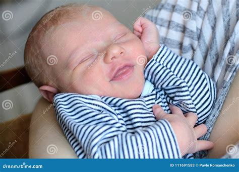 Newborn Baby Sleeps In The Arms Of His Mother Stock Image Image Of