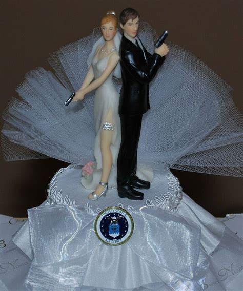 This african american funny wedding cake topper is a quickly penned note pinned to a pedestal along side a clearly surprised african american groom, is a funny twist on the usual cake topper. Super Sexy Air Force Bride and Groom with Gun Cute Funny ...