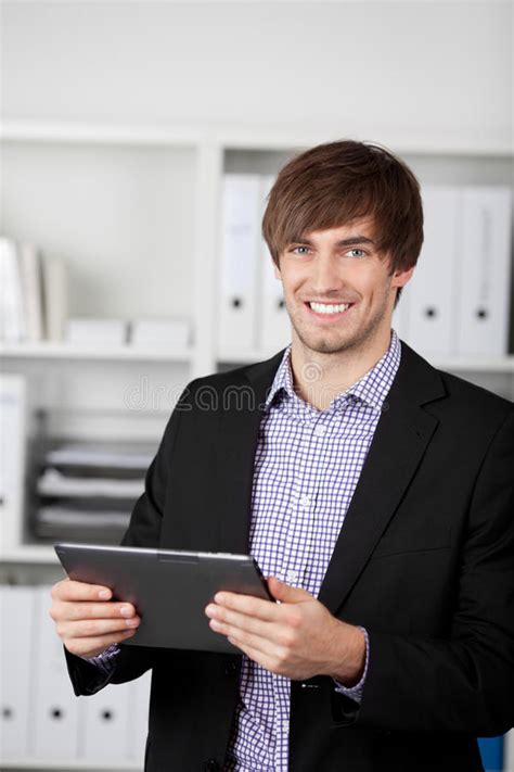 Businessman Holding Digital Tablet In Office Stock Photo Image Of