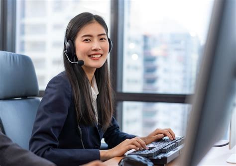 Premium Photo Happy Smiling Operator Asian Woman Customer Service Agent With Headsets